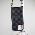 Black checkered leather iPhone wallet case showing the fitted phone shell and camera opening