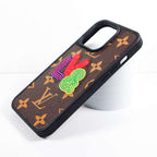 Embroidered leather iPhone case showing the stitched design and textured back cover
