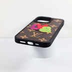 Embroidered iPhone case in leather showing the rear design, camera cutout and edges