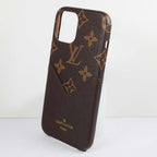 Close-up of the brown card holder iPhone case showing the card storage detail