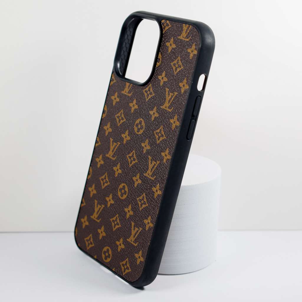 Brown monogram leather iPhone case showing the patterned back and smooth leather finish