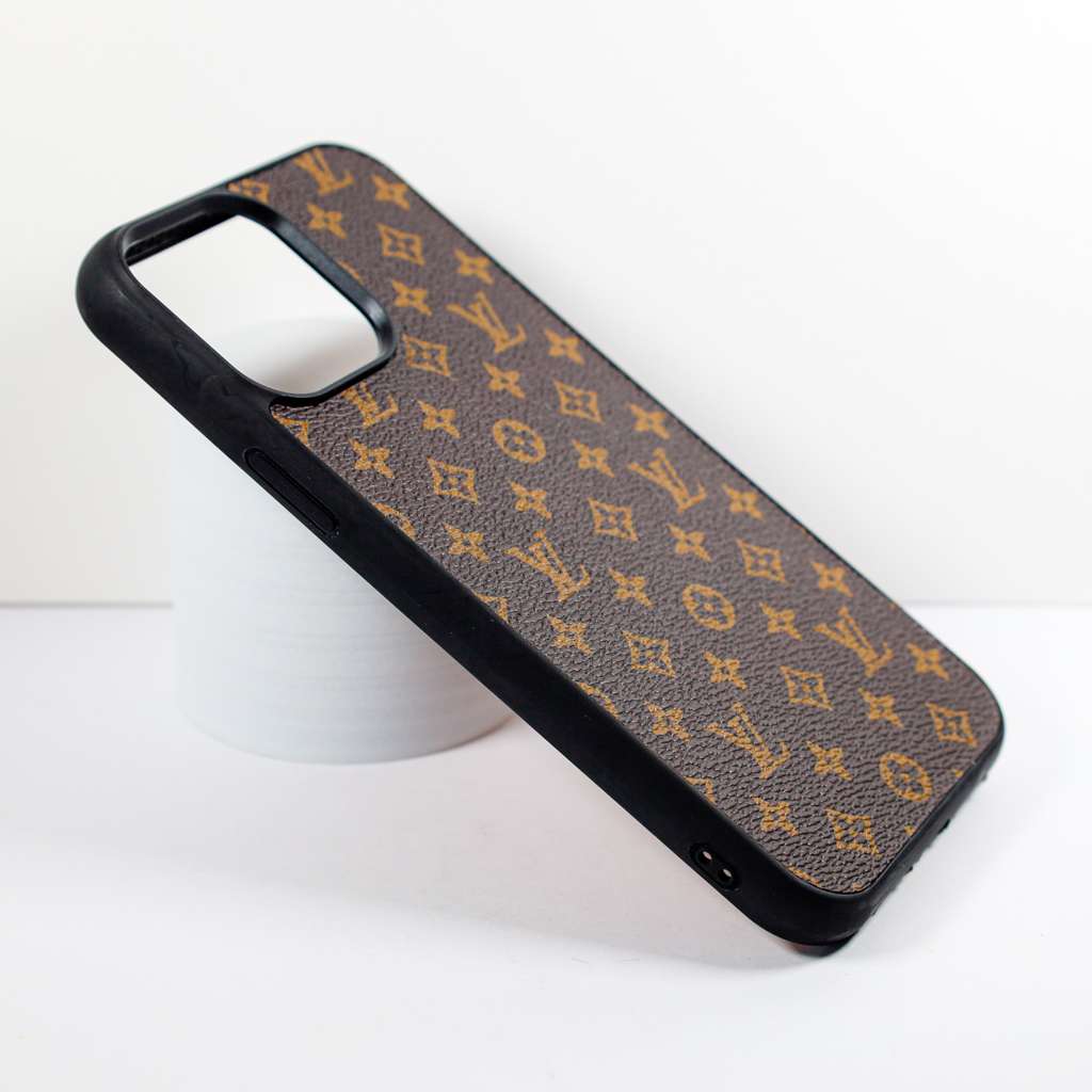 Brown patterned leather iPhone case showing the fitted edges and protective back cover