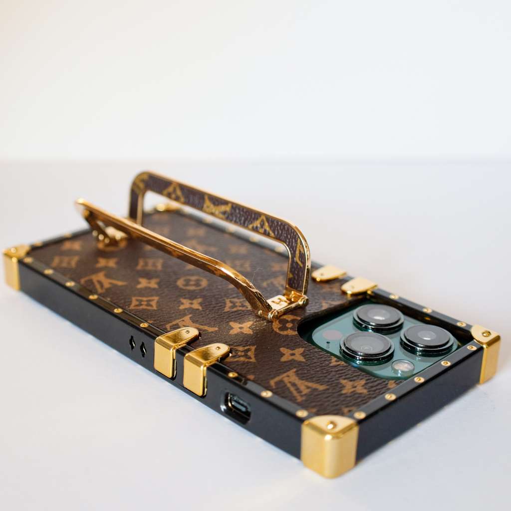 Luxury trunk iPhone case showing the slim fitted profile, camera area and finished edges