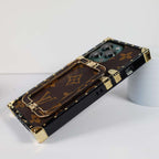 Louis Vuitton trunk iPhone case showing the fitted camera opening and protective corners