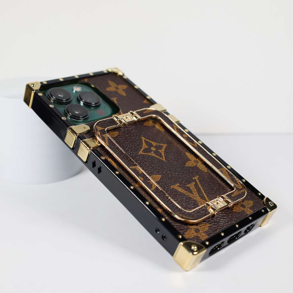 Louis Vuitton trunk iPhone case showing the trunk-style back and slim protective profile
