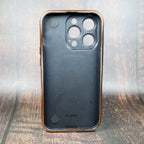 Close-up of the latte LV folding iPhone case showing the patterned cover and strap