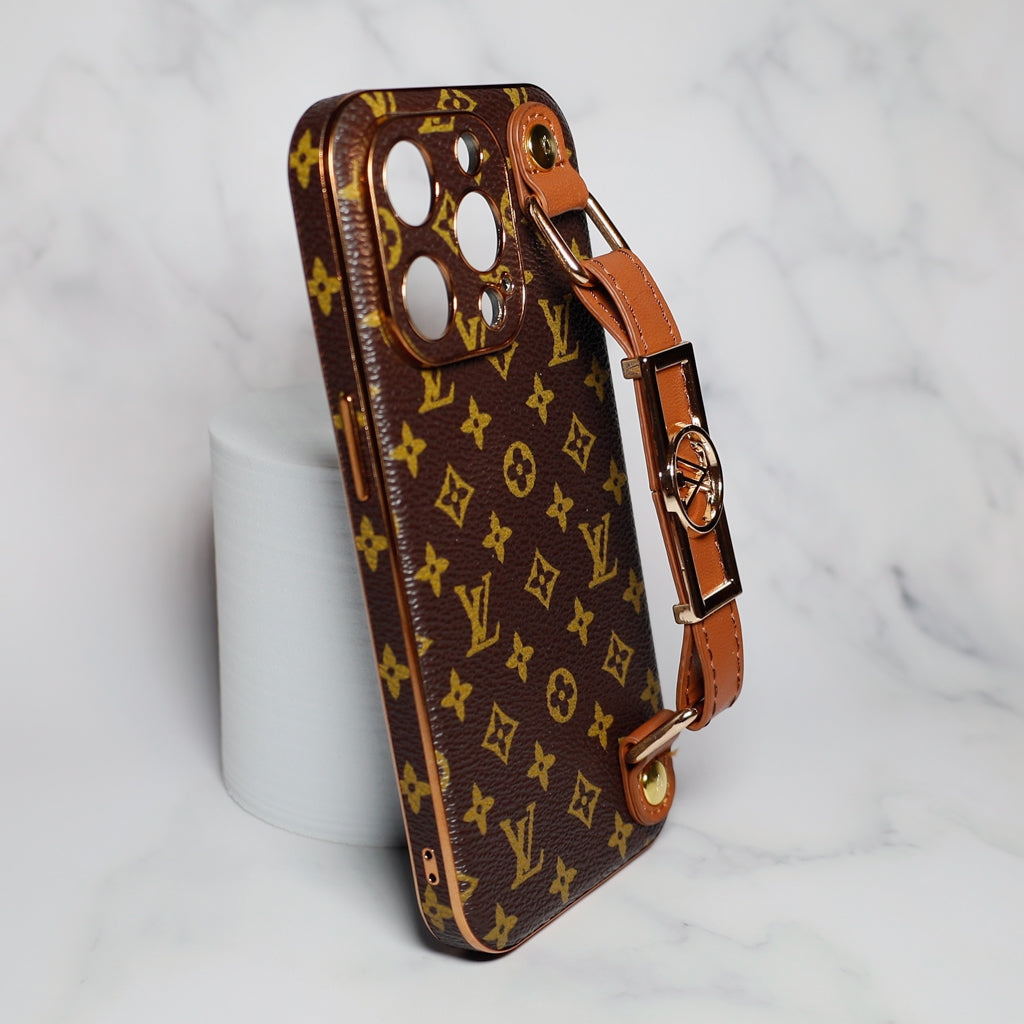 LV brown iPhone case with strap showing the folding design and protective camera area