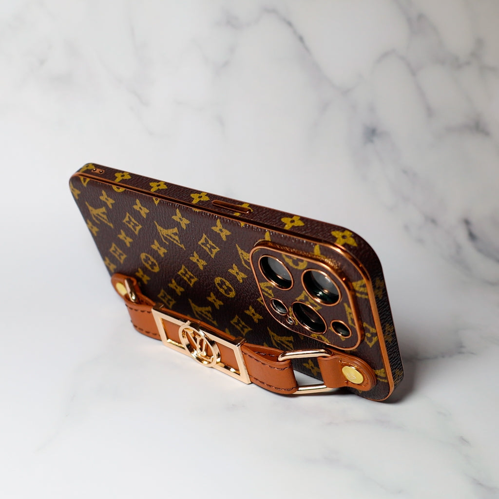 LV folding iPhone case with strap showing the full brown patterned exterior and fit