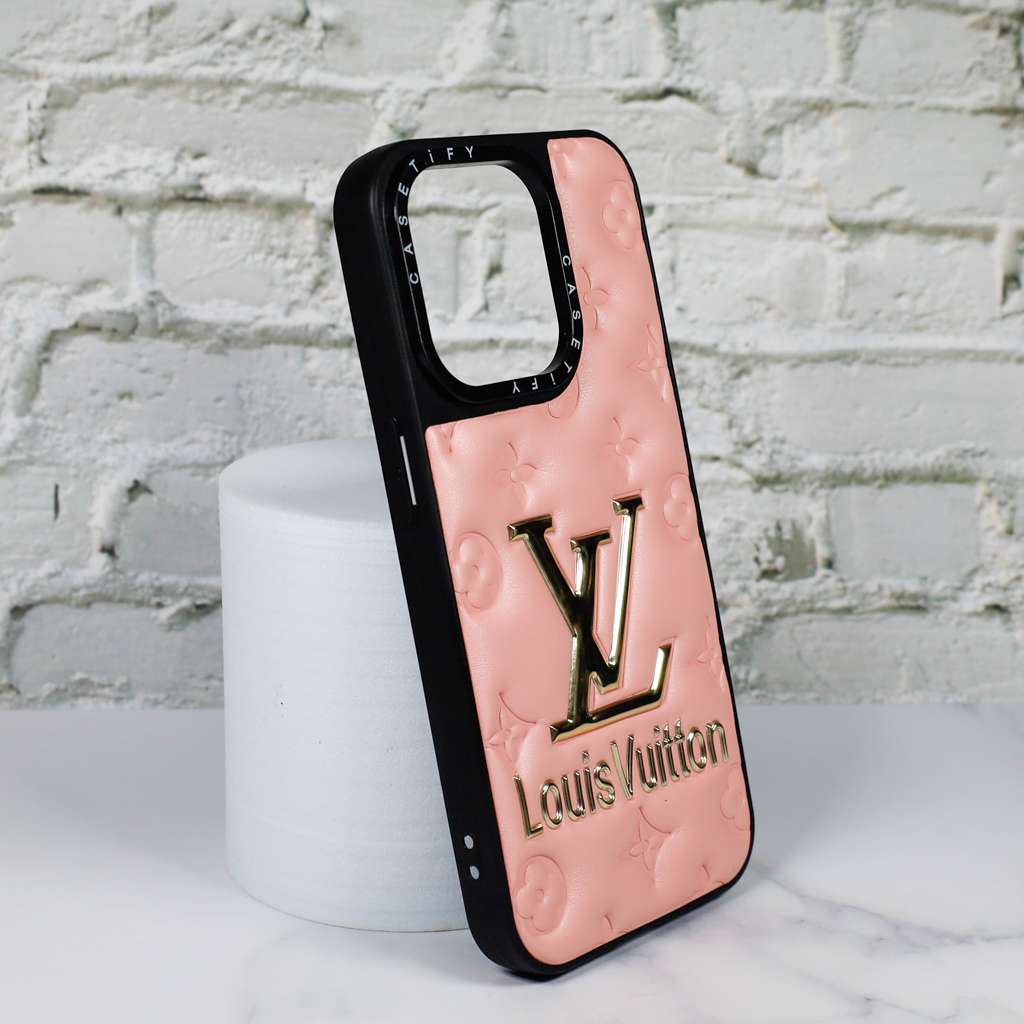Close-up of the pink stamped leather iPhone case highlighting texture and pattern