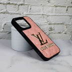 Pink LV stamped leather iPhone case shown from the back with protective camera coverage