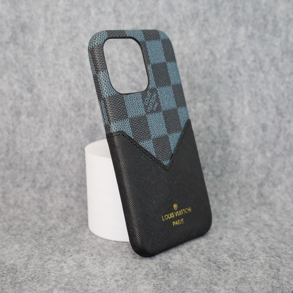 Close-up of the black checkered iPhone case showing the leather texture and pattern