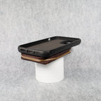 Zipped card holder iPhone case showing the folding wallet profile and leather finish