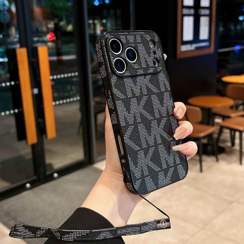 Hand strap MK iPhone case showing the fitted edge profile and decorative rear finish