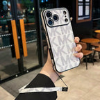 MK iPhone case with hand strap showing the patterned back cover and camera protection