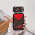 Magnetic card holder LV iPhone case showing the patterned leather back and detachable wallet