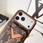Detailed view of the LV iPhone case with magnetic card storage and protective back