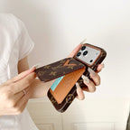 Close-up of the magnetic card holder iPhone case showing the wallet connection and back