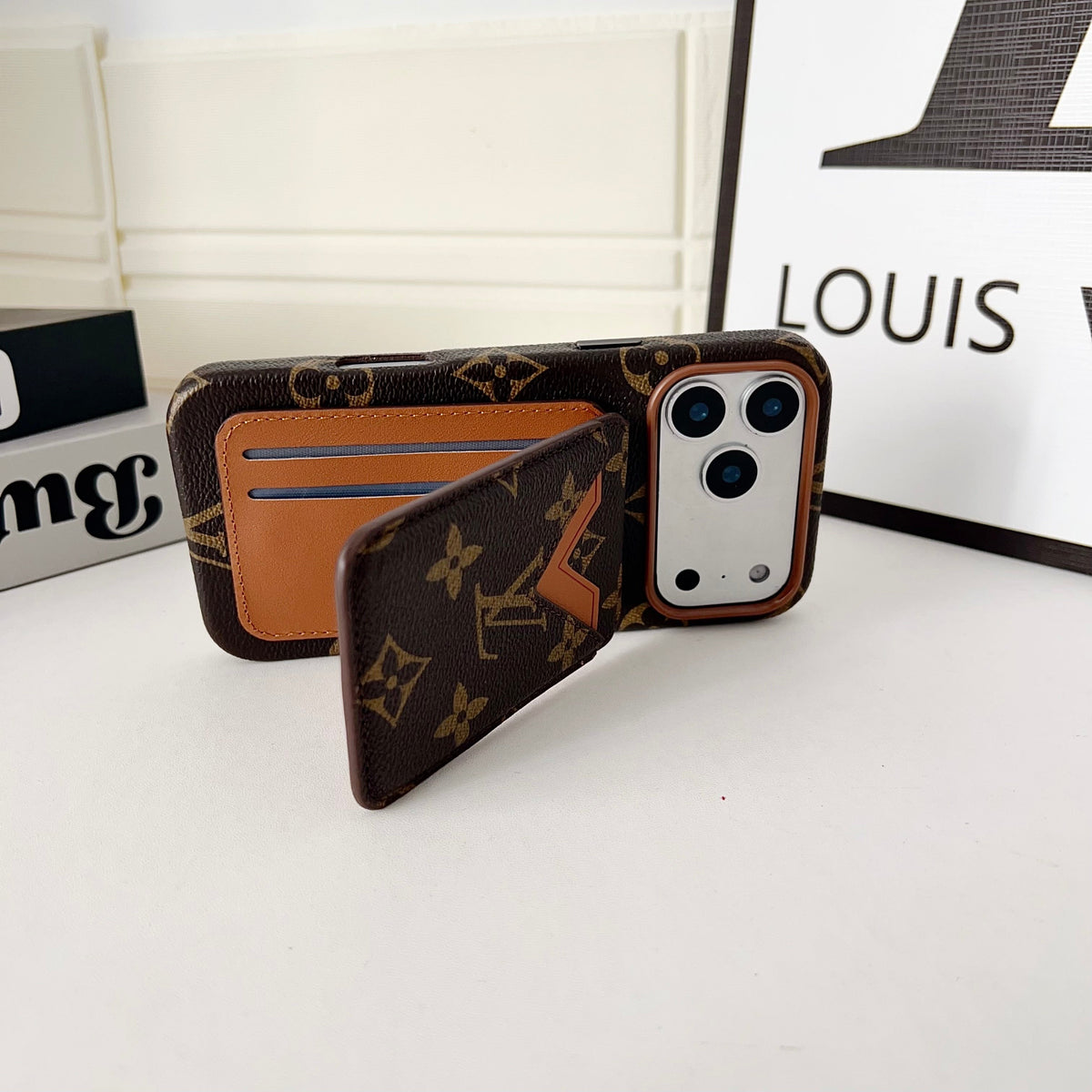 iPhone case with magnetic card holder showing the detachable wallet and rear cover