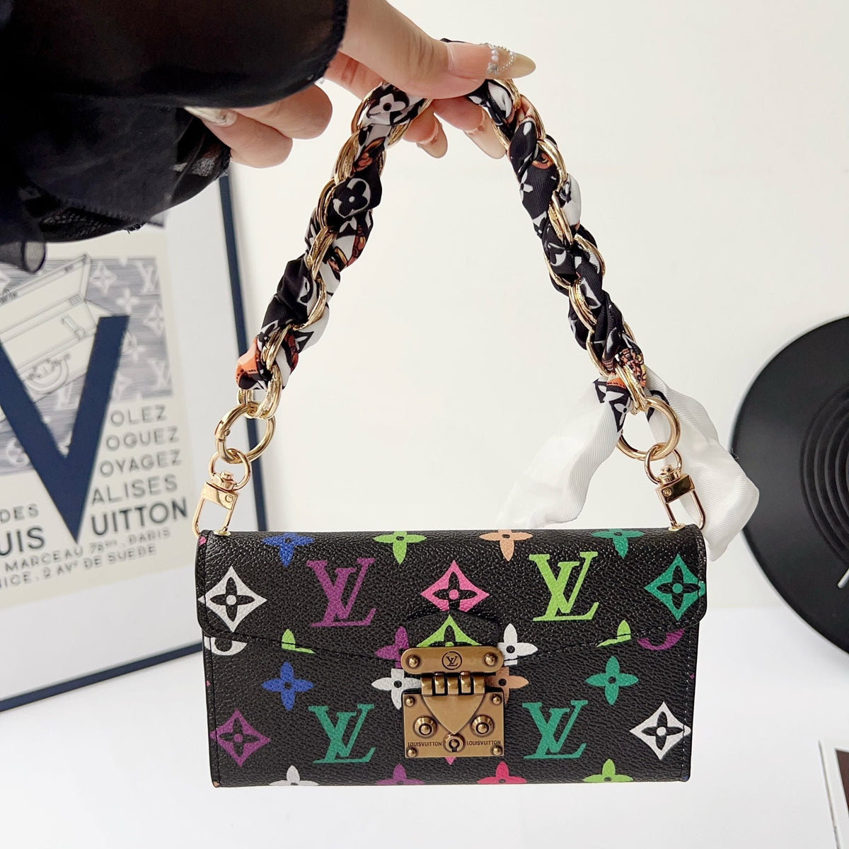 Multicolor crossbody wallet iPhone case showing the leather finish and slim protective fit