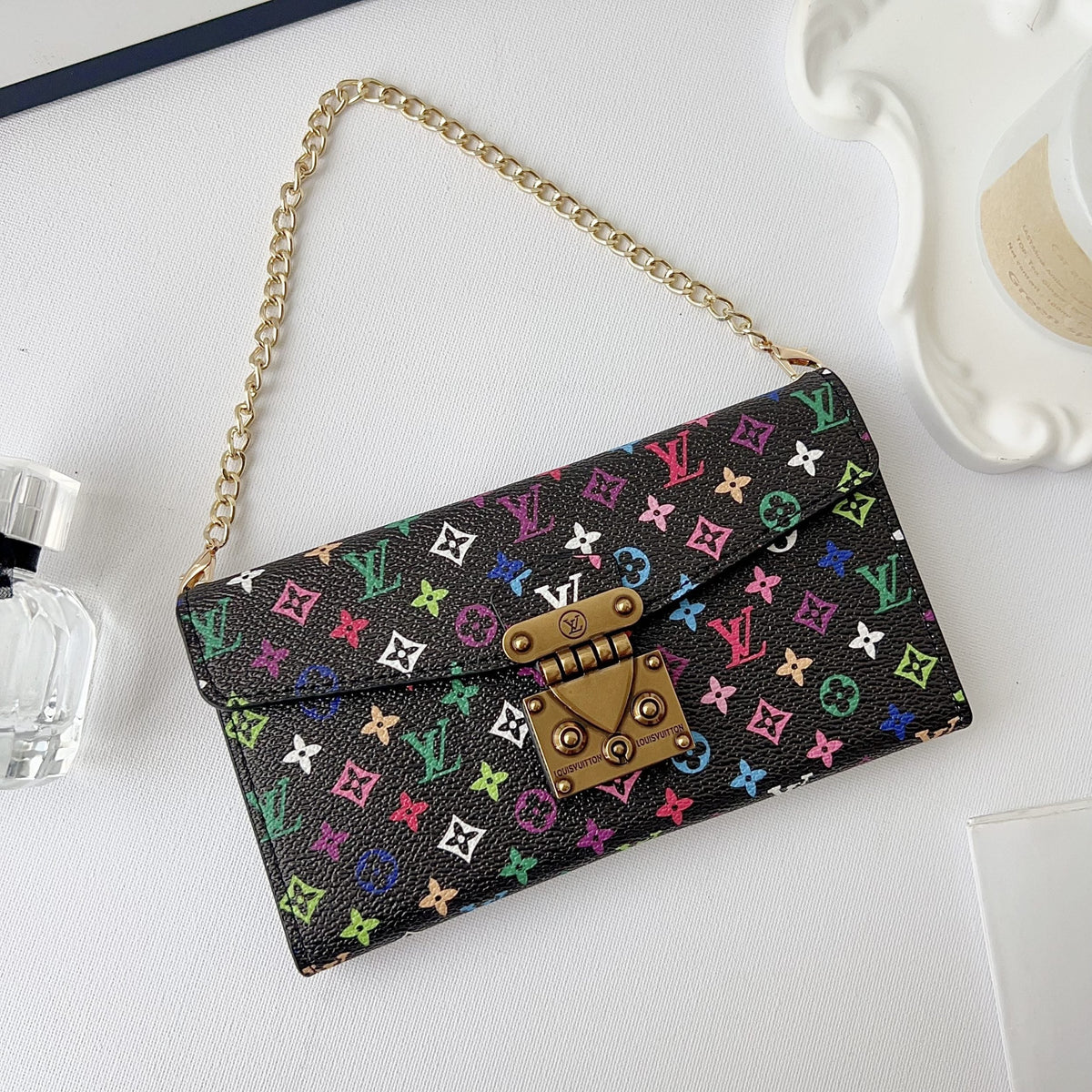 Crossbody wallet phone case showing the colorful back design and camera protection