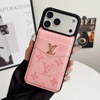 Louis V vertical folding card holder iPhone case showing the rear wallet design and protective corners