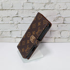 Zippered LV wallet iPhone case showing the protective rear cover and zipper detail