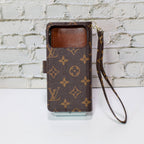 Zippered LV wallet iPhone case showing the slim folio profile and card storage