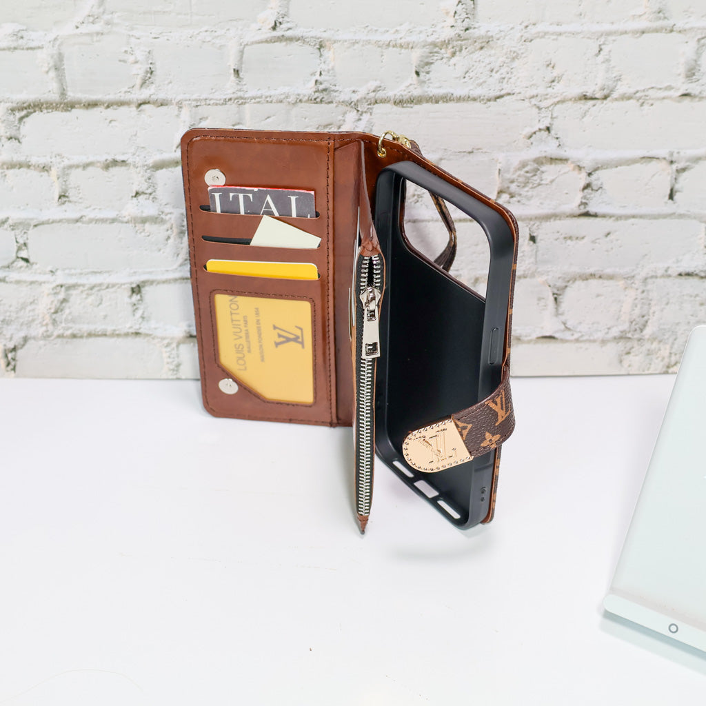 Zippered LV wallet iPhone case showing the card holder and fitted camera opening