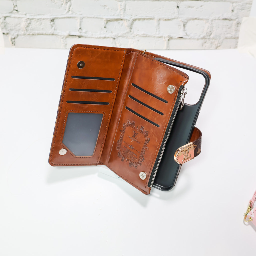 Zippered LV wallet iPhone case close-up showing zipper detail and card storage