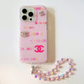 Cream and pink logo-print iPhone case with a beaded wrist strap