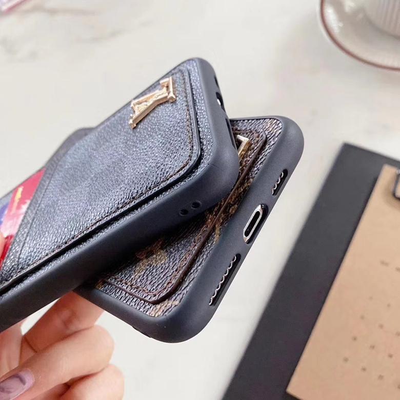 Close-up of the dual card slot iPhone case showing leather texture and card storage