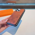 Plain brown leather iPhone case showing the smooth back cover and natural leather finish