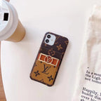 Close-up of the monogram leather iPhone case highlighting pattern and material texture