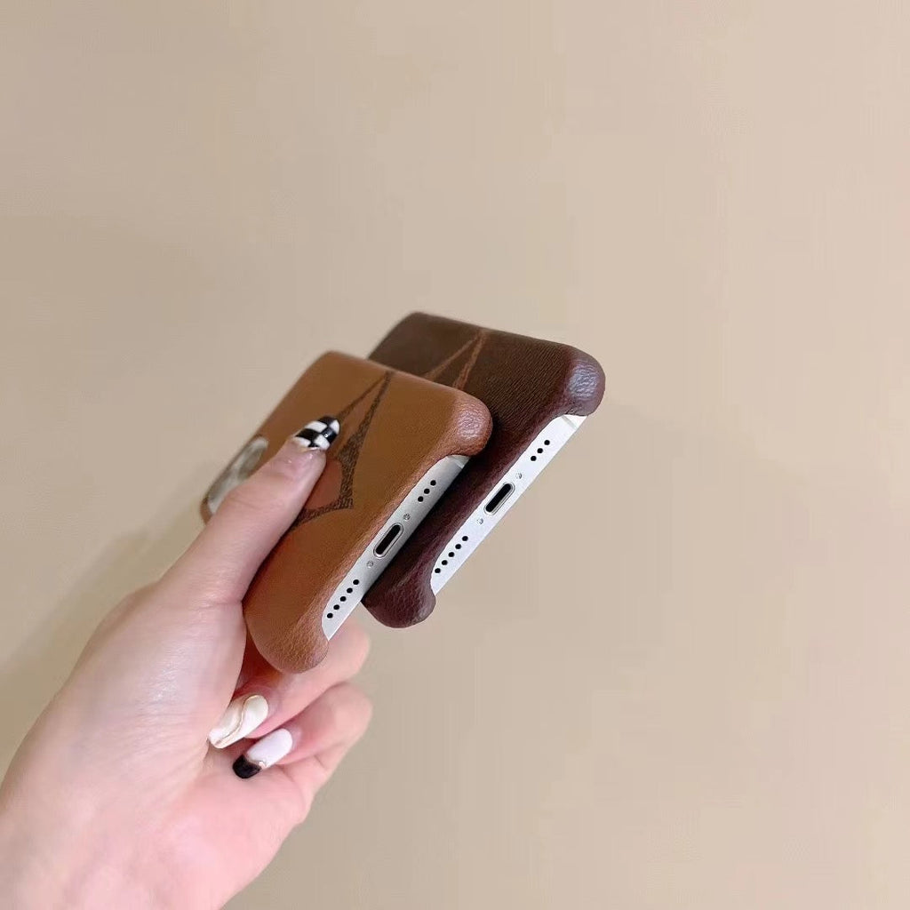 Detailed view of the brown single monogram iPhone case and its patterned back surface
