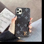 Detailed view of the leather iPhone case with dual card storage and finished edges