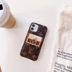 Monogram leather iPhone case showing the patterned rear cover and smooth leather finish