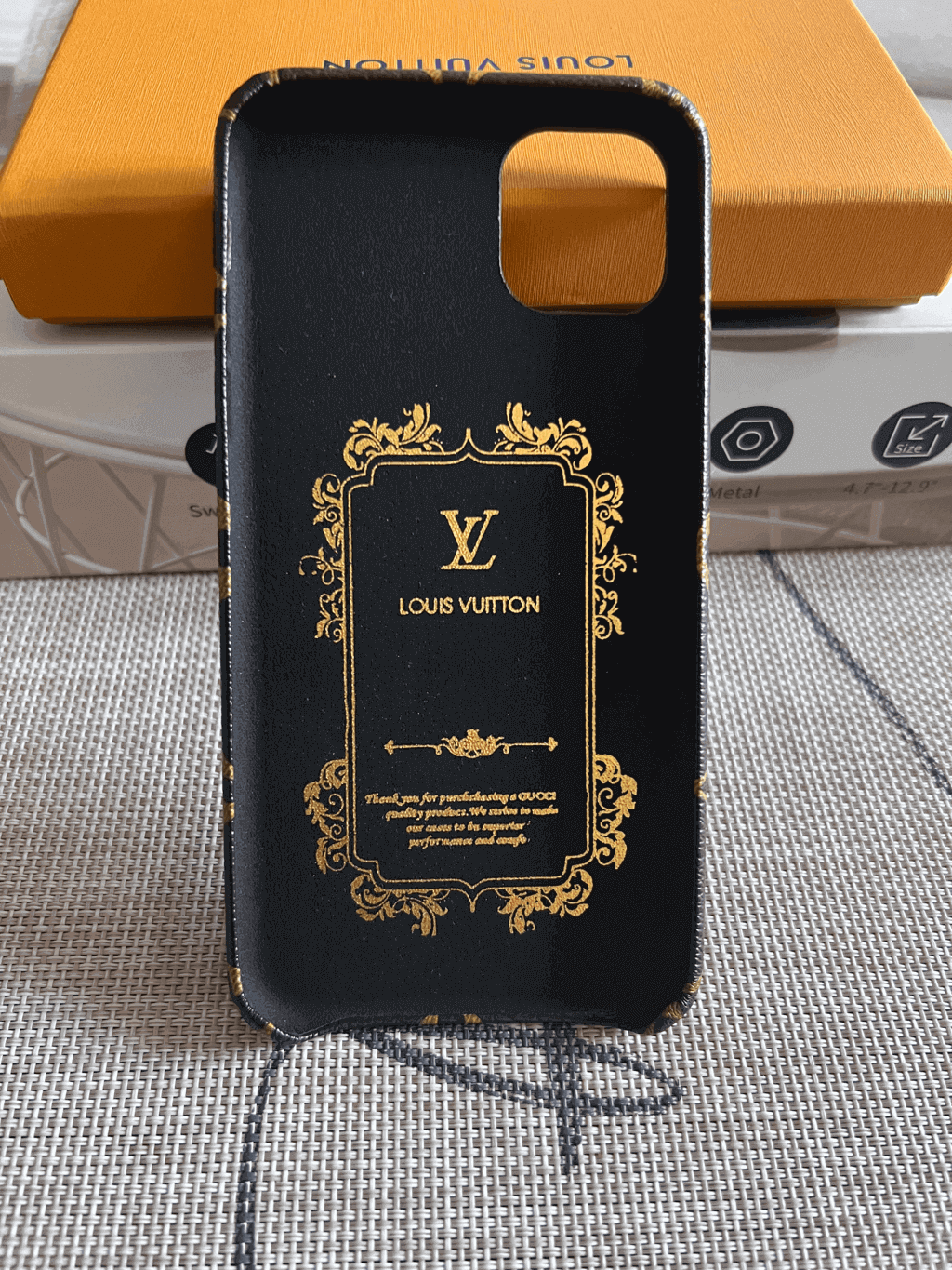 Leather iPhone case with monogram finish showing the slim edges and rear protection