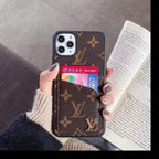 Leather wallet iPhone case with dual card slots shown in a close-up product view