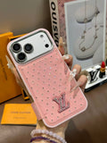 Pink dotted iPhone case with a back card pocket and raised monogram detail
