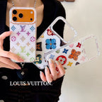 White multicolor monogram LV iPhone case close-up showing the decorative rear design