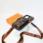 LV crossbody wallet iPhone case close-up showing the strap attachment and patterned back