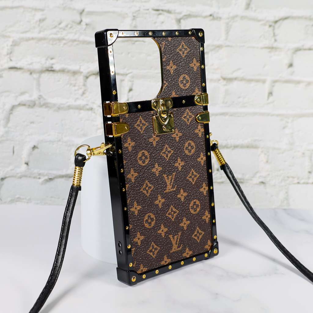 Designer trunk iPhone case left side view showing the structured edge profile