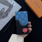 Blue denim leather iPhone wallet case showing the woven fabric finish and protective cover