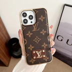 Brown monogram electroplated iPhone case showing the patterned back and polished frame