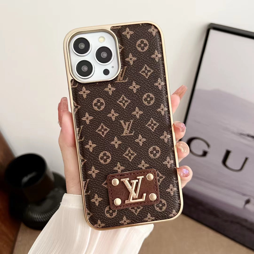 Brown small monogram iPhone case showing the electroplated edge and patterned leather back
