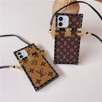 LV trunk iPhone case close-up showing the trunk-inspired details and protective corners
