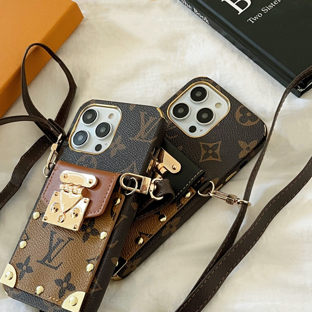 Close-up product view of the LV monogram crossbody iPhone case and shoulder strap detail