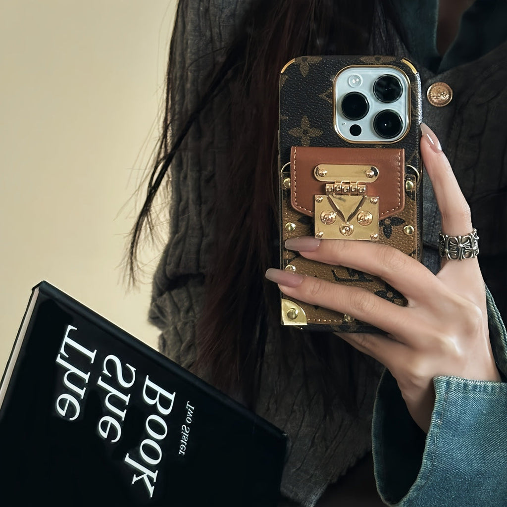 LV monogram crossbody iPhone case showing the carrying strap and slim fitted profile