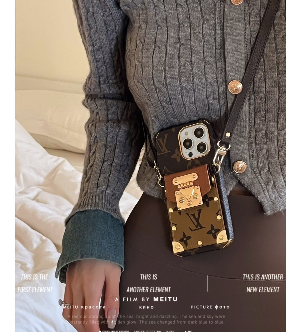 Close-up of the LV monogram crossbody iPhone case showing leather texture and strap attachment