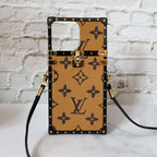Latte LV trunk iPhone case showing the light patterned back and structured protective frame